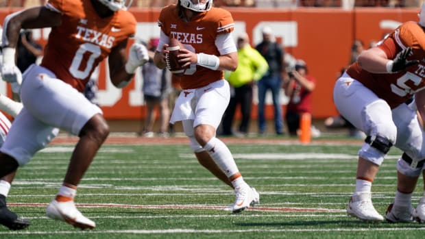 Texas Longhorns quarterback Quinn Ewers (3) looks to throw a pass against the Alabama Crimson Tide during the first half at at Darrell K Royal-Texas Memorial Stadium.